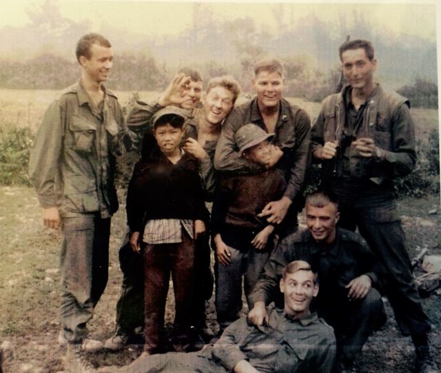 Russell with fellow servicemen in Vietnam