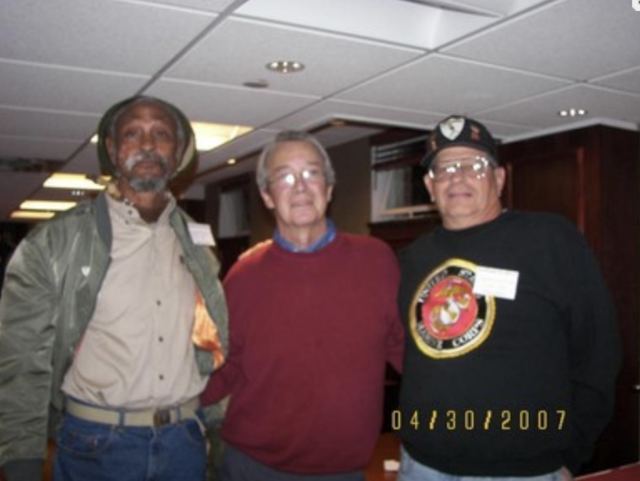 Russell (center) with fellow veterans at a 2/9 reunion, April 30, 2007